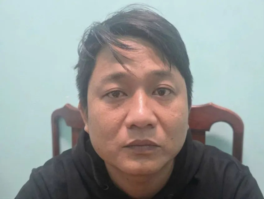 Nguyễn Quốc Khánh tại cơ quan Công an. Ảnh: CA trộm 13 con chó.jpg