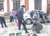 Thu giữ hàng tạ thuốc nổ trong nhà các bị can ở Quảng Bình ảnh 2 Một phụ nữ vận chuyển 74 kg thuốc nổ trên ô tô