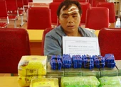Triệt phá hai chuyên án ma túy lớn trong dịp Tết Nguyên đán ảnh 2 Thầy giáo mang súng vận chuyển 20 bánh heroin