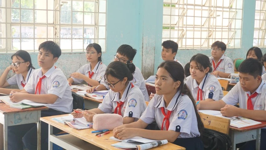 Học sinh Trường THCS Nguyễn Hiền, quận 12 trong một giờ học. Ảnh minh hoạ: NGUYỄN QUYÊN hoạt động dạy thêm