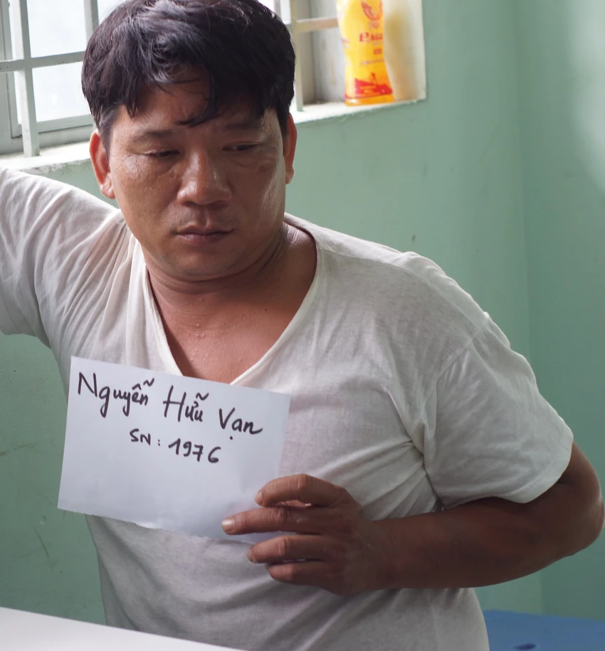 Tạt xăng đốt hai người để giải quyết mâu thuẫn ảnh 1