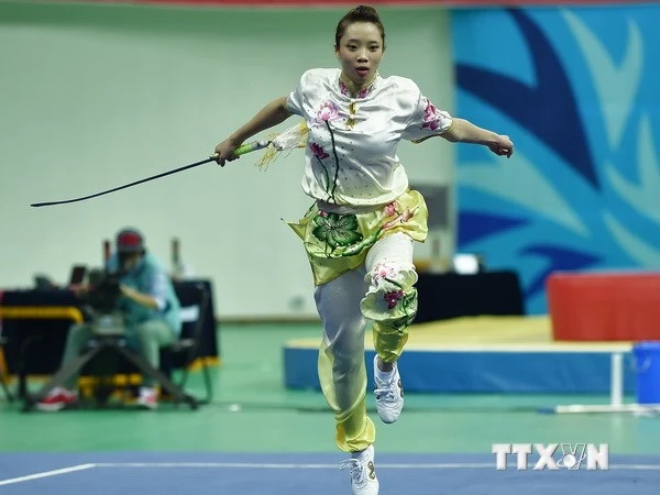 Wushu giành HCV đầu tiên cho Việt Nam tại ASIAD ảnh 1