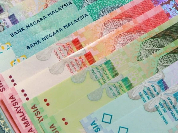 Cảnh sát Malaysia tình cờ bắt tổ chức sản xuất tiền giả ảnh 1 Cảnh sát Malaysia tình cờ bắt tổ chức sản xuất tiền giả ảnh 1