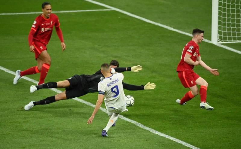 Benzema vẫn rất xuất sắc. Salah thì giỏi, còn Modric đã giỏi lại còn giàu kinh nghiệm. Bàn thắng duy nhất của Vinicius Jr ở phút 59. Courtois quá xuất sắc làm nản lòng các chân sút Liverpool. ...Thùa thì thôi mà...đã nỗ lực hơn 200% sức lực rồi. Chiến lược gia Ý Carlo Ancelotti đi vào "ngôi đền huyền thoại". Ông đã có bốn danh hiệu Champions League. Real có rất nhiều cầu thủ có năm danh hiệu Champions League. Real về nhất La Liga và Champions League. Liverpool có hai ngôi á quân (Premier League và Champions League).