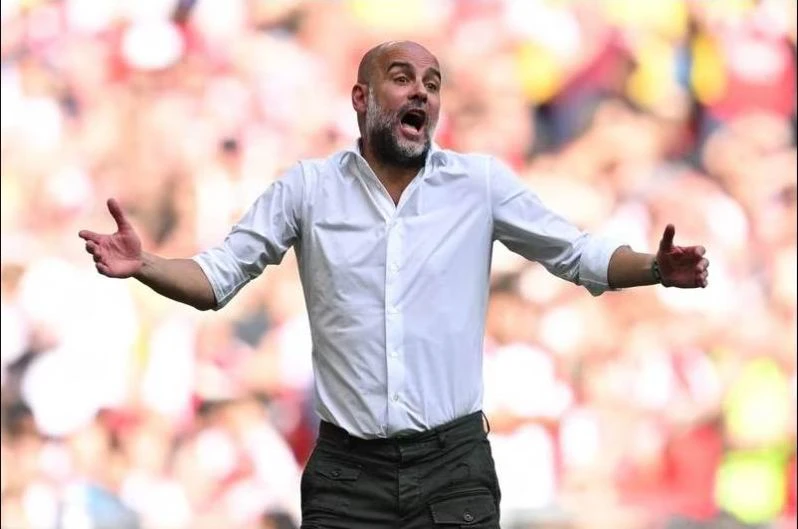 HLV Pep Guardiola không tin vào mắt mình ngay sau bàn san bằng 1-1 của Leandro phút 90+11 và rồi Man. City thua cuộc ở "loạt đấu súng". Ảnh: AFP Lâu lắm rồi Arsenal mới có danh hiệu trở lại. Ảnh: AFP