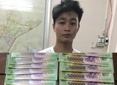 Bắt nhóm làm tiền giả thủ súng và ma túy ở TP.HCM