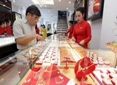 Giá vàng tăng 'bốc đầu', hướng về mốc 1.700 USD/ounce