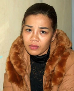 Trương Thị Thưa tại trụ sở công an. thua-1-9761-1401368083.jpg