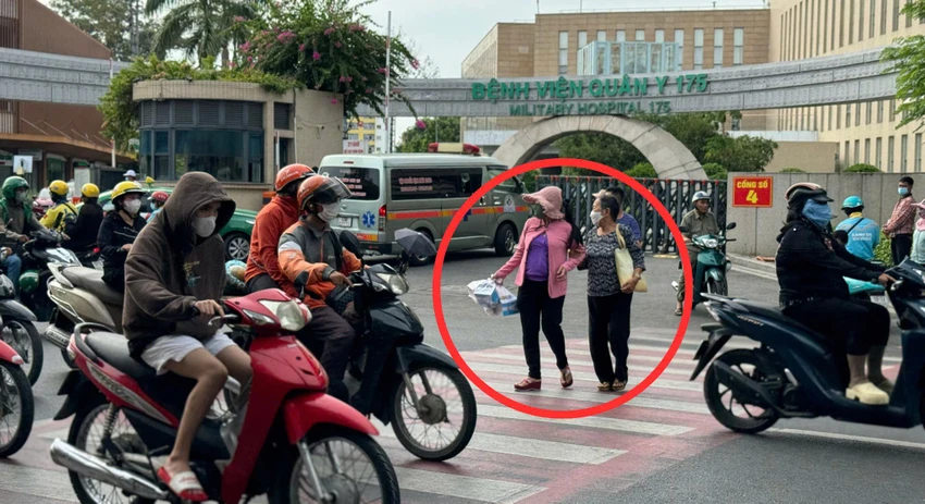 đi bộ qua đường Nguyễn Thái Sơn