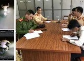 Nam thanh niên mặc váy hồng đi xe máy, buông cả hai tay