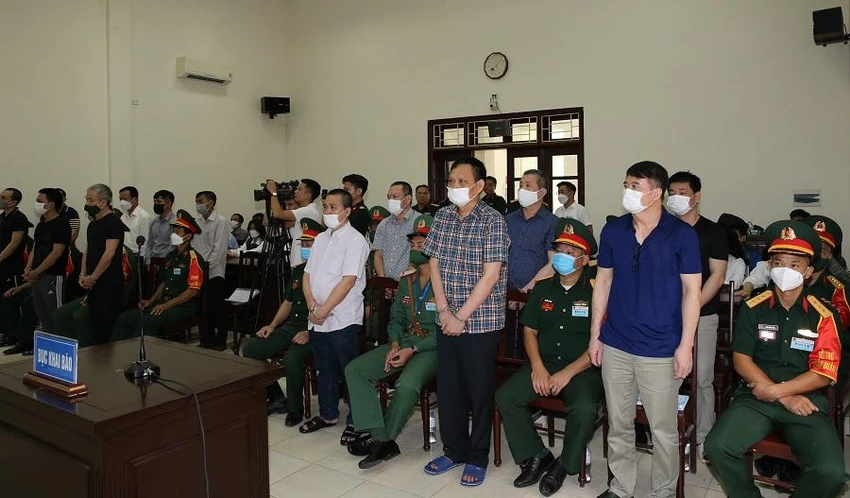 Các bị cáo tại tòa ngày 12-7. Ảnh: Thông tấn Quân sự Các bị cáo tại tòa ngày 12-7. Ảnh: Thông tấn Quân sự