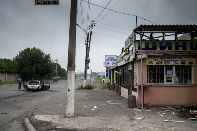 Ukraine: Chiến tranh biến Lugansk thành "thị trấn ma" ảnh 6