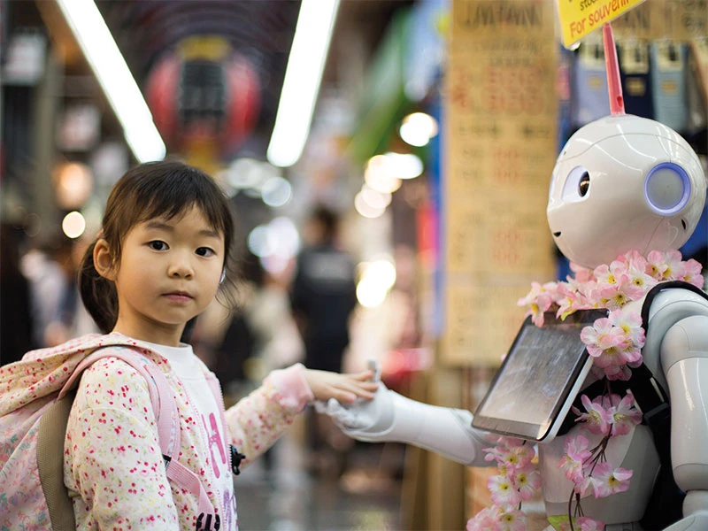Robot có thể hỗ trợ trẻ em học tốt hơn nhưng không thể thay thế cha mẹ giáo dục con cái hiệu quả. Ảnh minh họa: ANDY KELLY/ UNSPLASH