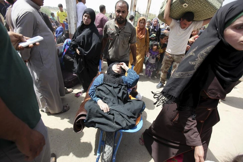 Ảnh: Người dân IRaq lũ lượt chạy trốn IS ảnh 2 Ảnh: Người dân IRaq lũ lượt chạy trốn IS ảnh 2