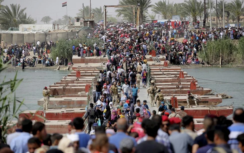 Ảnh: Người dân IRaq lũ lượt chạy trốn IS ảnh 1 Ảnh: Người dân IRaq lũ lượt chạy trốn IS ảnh 1