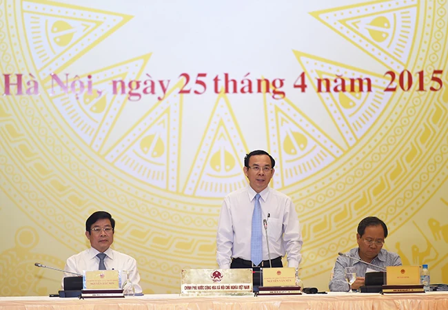 Bộ trưởng-Chủ nhiệm VPCP Nguyễn Văn Nên chủ trì phiên họp báo thường kỳ Chính phủ tháng 4/2015 - Ảnh: VGP/Quang Hiếu