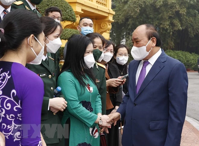 Chủ tịch nước: 'Chăm lo nhiều hơn đời sống vật chất, tinh thần cho đội ngũ y tế' ảnh 1 Chủ tịch nước: 'Chăm lo nhiều hơn đời sống vật chất, tinh thần cho đội ngũ y tế' ảnh 1