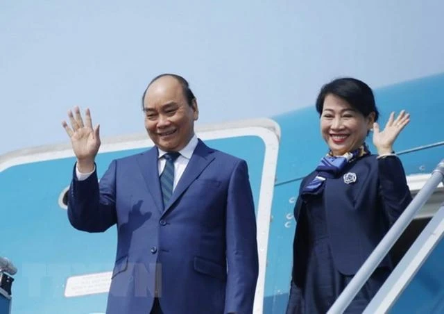 Chủ tịch nước Nguyễn Xuân Phúc và phu nhân trong một chuyến thăm. Ảnh: TTXVN