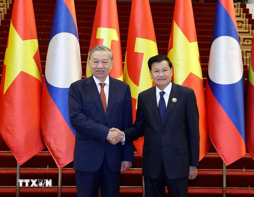 chuyen-tham-cua-tong-bi-thu-mo-ra-mot-chuong-moi-nang-tam-quan-he-viet-lao.jpg