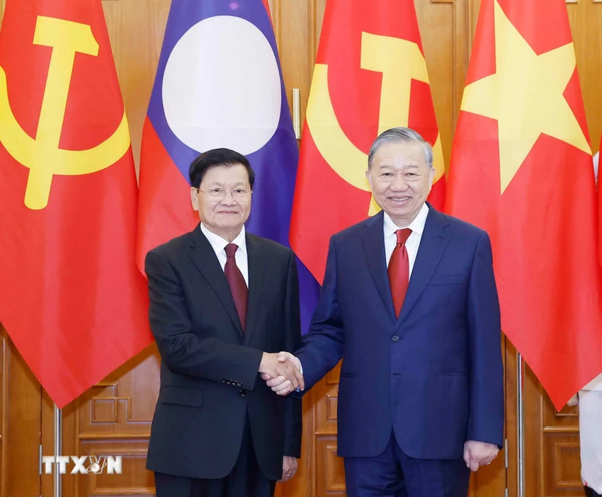 2610-tong-bi-thu-hoi-dam-tong-bi-thu-chu-tich-nuoc-lao-1.jpg