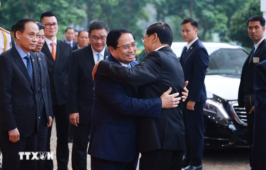 thu-tuong-hoi-kien-tong-bi-thu-chu-tich-nuoc-lao-thongloun-sisoulith-.jpg