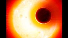 This is an artist's impression of the exoplanet HAT-P-11b. The planet has an extended helium atmosphere that's being blown away by the star, an orange dwarf star smaller but more active than our sun.