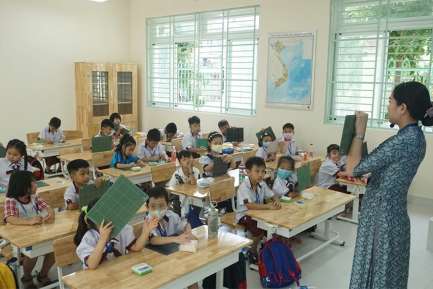 Một tiết học của cô trò Trường Tiểu học Lương Thế Vinh, quận Bình Tân. Ảnh: NGUYỄN QUYÊN Một tiết học của cô trò Trường Tiểu học Lương Thế Vinh, quận Bình Tân. Ảnh: NGUYỄN QUYÊN
