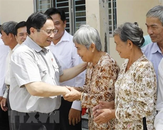 Thủ tướng gặp người dân xã Nhơn Ái, huyện Phong Điền, thành phố Cần Thơ. Ảnh: TTXVN Thủ tướng gặp người dân xã Nhơn Ái, huyện Phong Điền, thành phố Cần Thơ. Ảnh: TTXVN