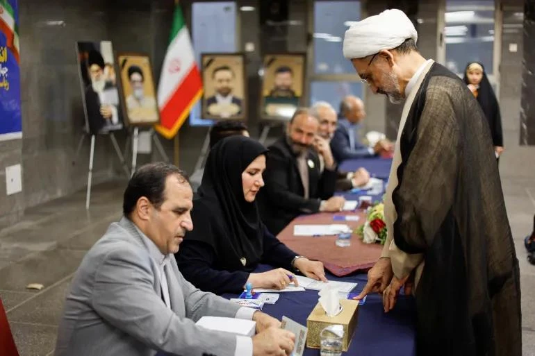 2024-06-28T081416Z_2017514538_RC26K8ALQ00D_RTRMADP_3_IRAN-ELECTION-IRAQ-1719570855.webp