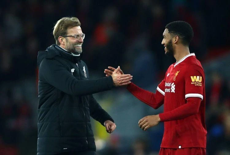 HLV Klopp vui mừng với sự trở lại của trung vệ tuyển Anh. Ảnh: CGI. HLV Klopp vui mừng với sự trở lại của trung vệ tuyển Anh. Ảnh: CGI.