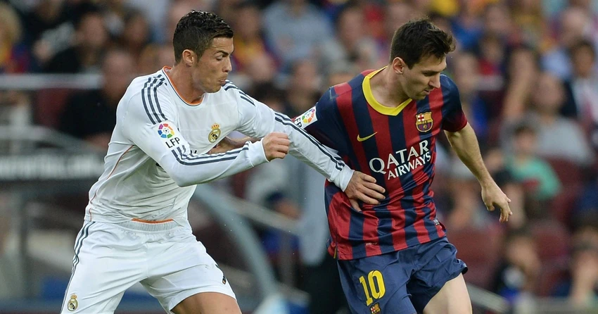 Hai ngôi sao lớn của bóng đá thế giới đã chia nhau 12 Quả bóng vàng trong 13 năm liên tiếp, với Messi 7 lần, Ronaldo 5 lần. Ảnh: GETTY.