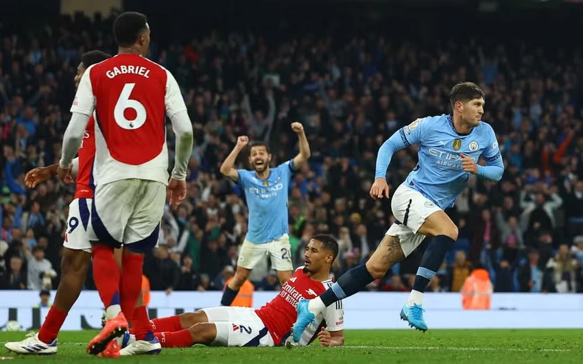 clb-man-city-cao-buoc-arsenal-den-toi-va-ban-thiu (1).jpg