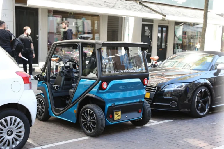 Squad Mobility xe năng lượng mặt trời chạy trong thành phố. Ảnh: Motorbiscuit. Squad Mobility xe năng lượng mặt trời chạy trong thành phố. Ảnh: Motorbiscuit.