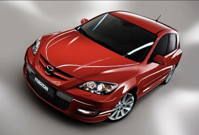 Mazdaspeed3 (Thế hệ thứ nhất). Ảnh: Carbuzz. Mazdaspeed3 (Thế hệ thứ nhất). Ảnh: Carbuzz.
