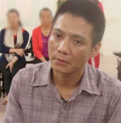 Người chồng côn đồ tại phiên toà phúc thẩm. vo1-3940-1426575245.jpg