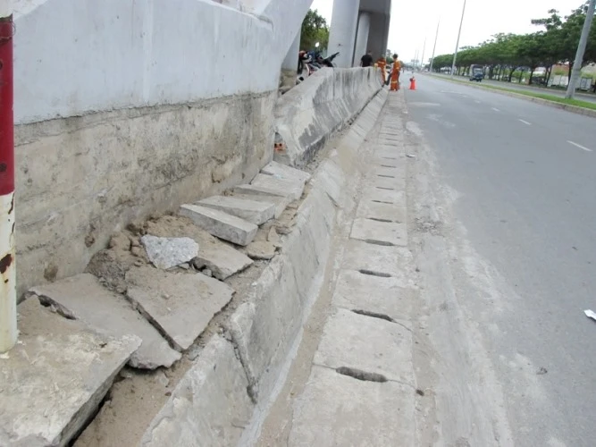 Chùm ảnh đại lộ Võ Văn Kiệt nứt toác, sụt lún ảnh 6 Chùm ảnh đại lộ Võ Văn Kiệt nứt toác, sụt lún ảnh 6