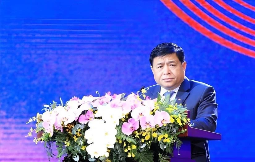 Bộ trưởng Bộ Kế hoạch và Đầu tư, ông Nguyễn Chí Dũng phát biểu tại diễn đàn sáng 19-12. Ảnh: H.A