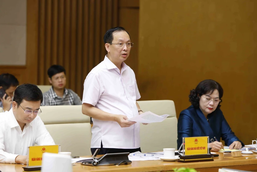 Phó Thống đốc NHNN Đào Minh Tú trình bày báo cáo. Ảnh: VGP Phó Thống đốc NHNN Đào Minh Tú trình bày báo cáo. Ảnh: VGP