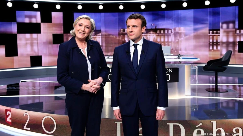 Hai ứng cử viên tổng thống Pháp năm 2022 Marine Le Pen (trái) và Emmanuel Macron. Ảnh: REUTERS