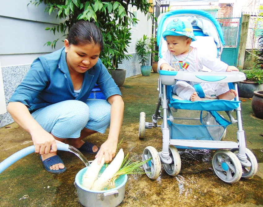 100% hộ dân quận 12 được sử dụng nước sạch ảnh 1