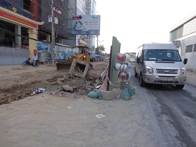 TP.HCM: Nhiều rào chắn được… 'sống' qua tết ảnh 6 TP.HCM: Nhiều rào chắn được… 'sống' qua tết ảnh 6