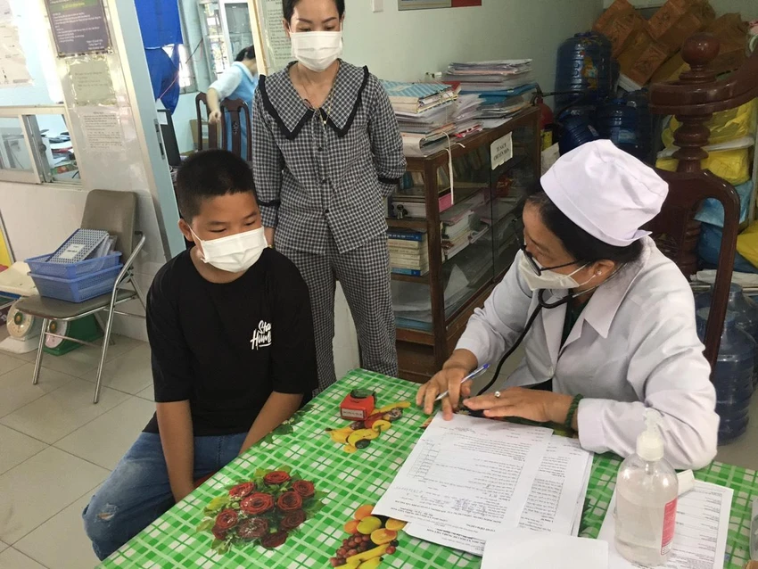 Phụ huynh học sinh an tâm khi đưa trẻ đến tiêm ngừa vaccine phòng Covid-19 Phụ huynh học sinh an tâm khi đưa trẻ đến tiêm ngừa vaccine phòng Covid-19