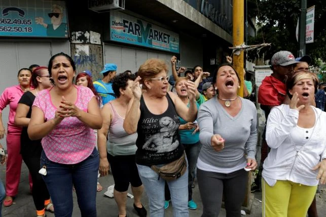 Venezuela: 4 tháng, hơn 2.000 cuộc biểu tình vì đói ảnh 2 Dân Venezuela biểu tình vì đói ở Caracas ngày 2-7.