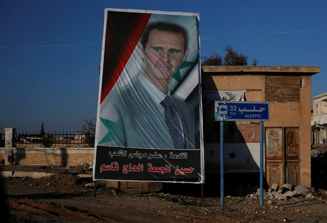 Hình ảnh Tổng thống Syria Bashar al-Assad tại cửa nam vào Aleppo. Ảnh: Ảnh: REUTERS 