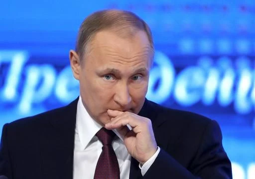 Tổng thống Putin trong cuộc họp báo dài 3 tiếng rưỡi tại Moscow ngày 23-12. Ảnh: AP