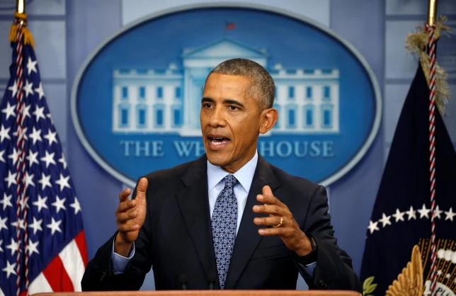 Tổng thống Barack Obama họp báo lần cuối tại Nhà Trắng ngày 18-1, hai ngày trước khi mãn nhiệm. Ảnh: REUTERS