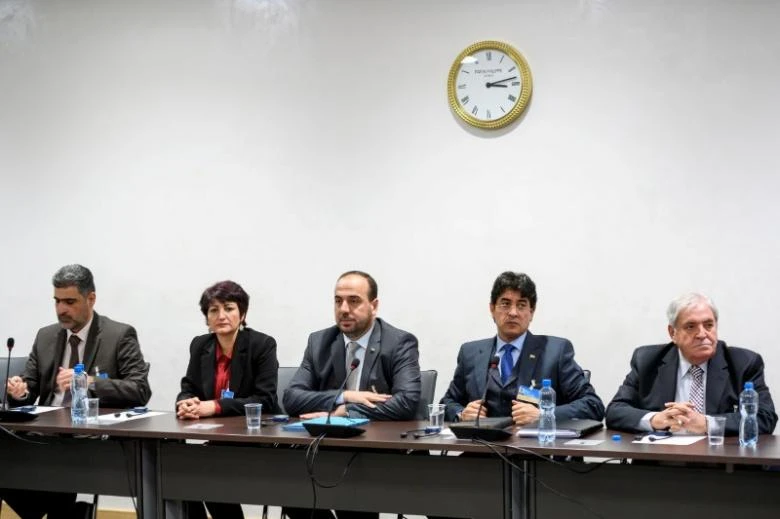 Phái đoàn phe nổi dậy Syria tham gia hòa đàm ở Geneva (Thụy Sĩ) ngày 27-2. Ảnh: REUTERS