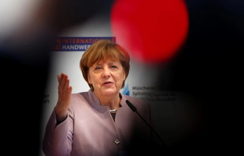 Thủ tướng Đức Angela Merkel trong một cuộc họp báo tại Đức ngày 13-3. Ảnh: REUTERS