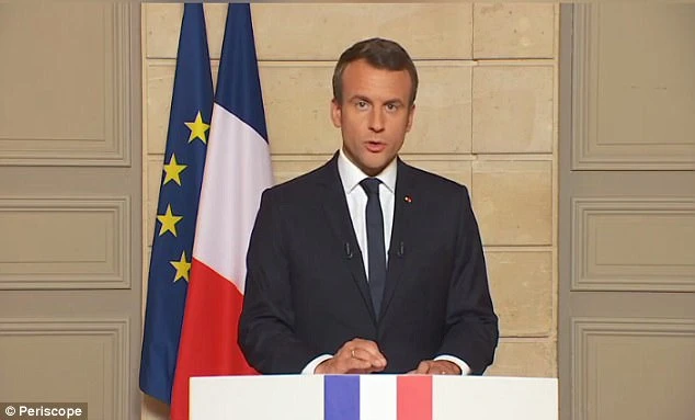Ông Macron phát biểu trên truyền hình Pháp tối 1-6 sau khi ông Trump xác nhận rút khỏi thỏa thuận khí hậu. Ảnh: AFP