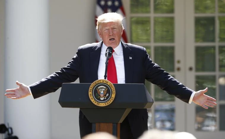 Từ Nhà Trắng ngày 1-6, ông Trump xác nhận sẽ rút Mỹ khỏi Thỏa thuận Khí hậu Paris. Ảnh: REUTERS